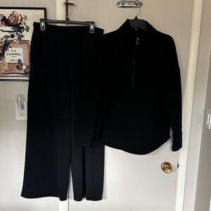 Women's Quilted quarter zip top and Black sweatpants.